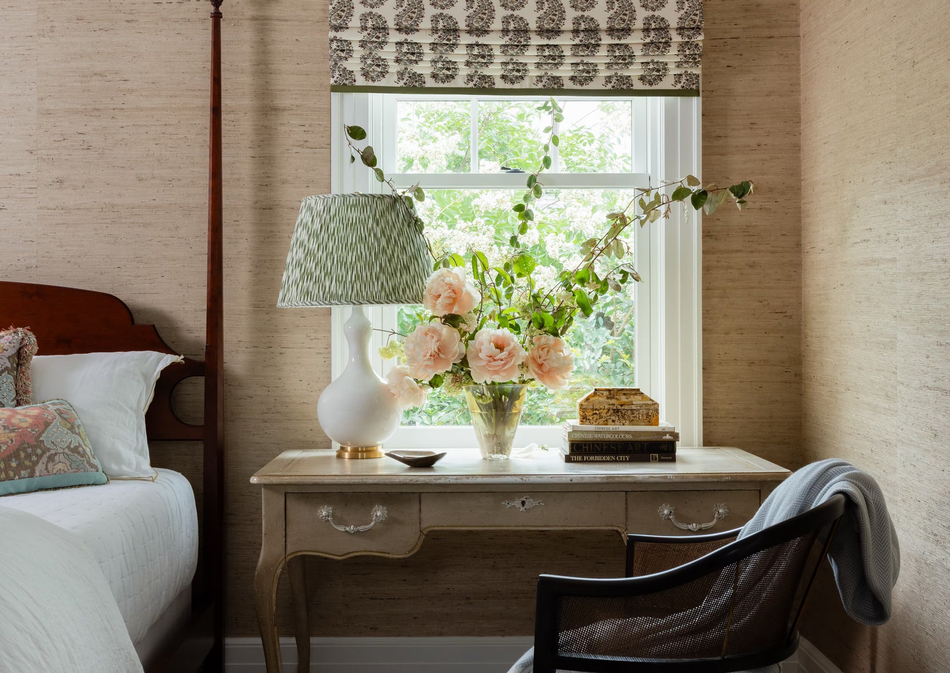 Bedroom styled with Farrow & Ball paint and grasscloth wallpaper from Celedore Charlotte showroom.